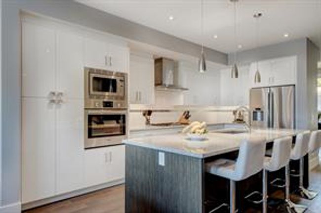 4004 2 St Nw, Home with 4 bedrooms, 3 bathrooms and 2 parking in Calgary AB | Image 5