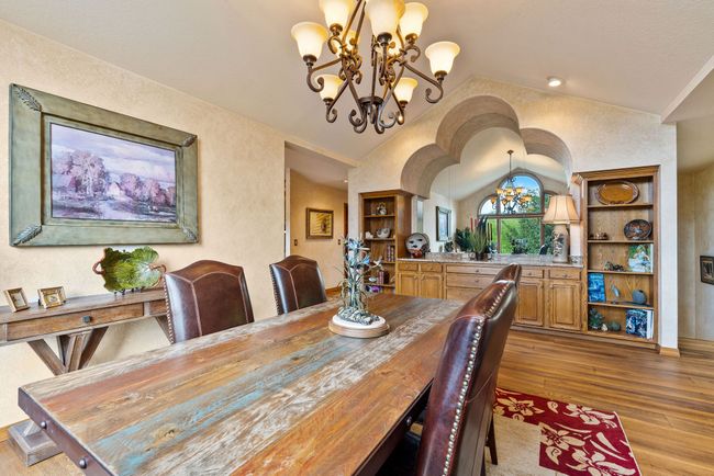 Large entertainment bar area with granite countertops | Image 26