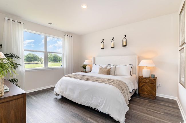 Bedroom with baseboards, visible vents, recessed lighting, and dark wood-type flooring | Image 13