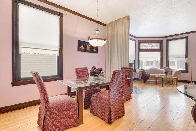 Looking back through the dining room to the living room. WIth spaces that flow one into the next, it's a great home for hosting friends and family. | Image 10