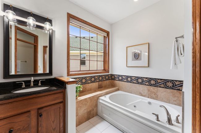 9946 Wellington Ln, Townhouse with 4 bedrooms, 3 bathrooms and null parking in Woodbury MN | Image 30