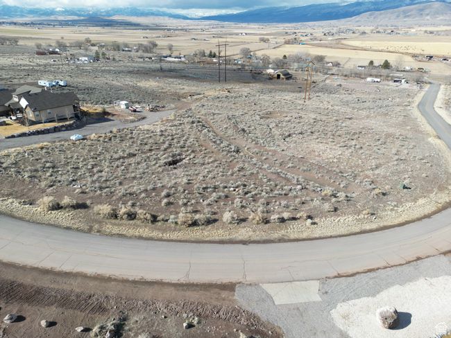 View of rural area featuring mountains | Image 4