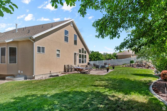 Back of house featuring a patio and stucco siding | Image 23