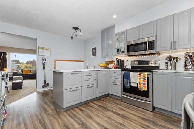 A - 8951 Craven Place, Home with 4 bedrooms, 2 bathrooms and 4 parking in Chilliwack BC | Image 6