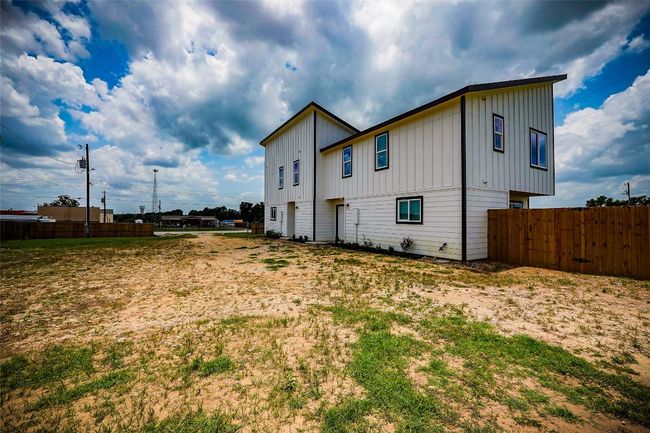 Back of house with board and batten siding | Image 5