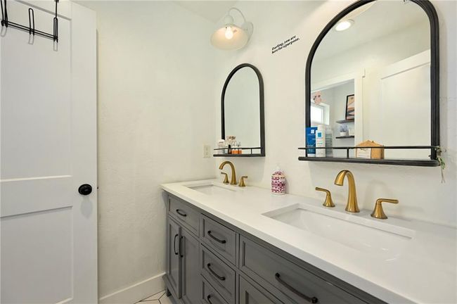 Bathroom with double vanity. Quartz countertops | Image 42