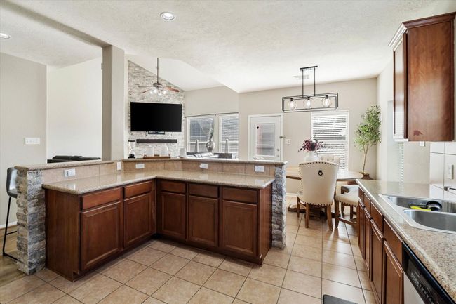 Kitchen is open to the Living Room | Image 6