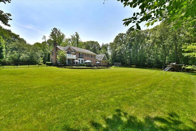 View of yard featuring a playground | Image 37