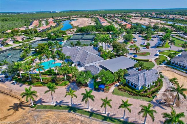 Aerial view showing the golf course that is in renovation and the lushness of the community | Image 47