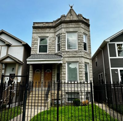 1923 S Sawyer Avenue, Home with 8 bedrooms, 3 bathrooms and 3 parking in Chicago IL | Image 1