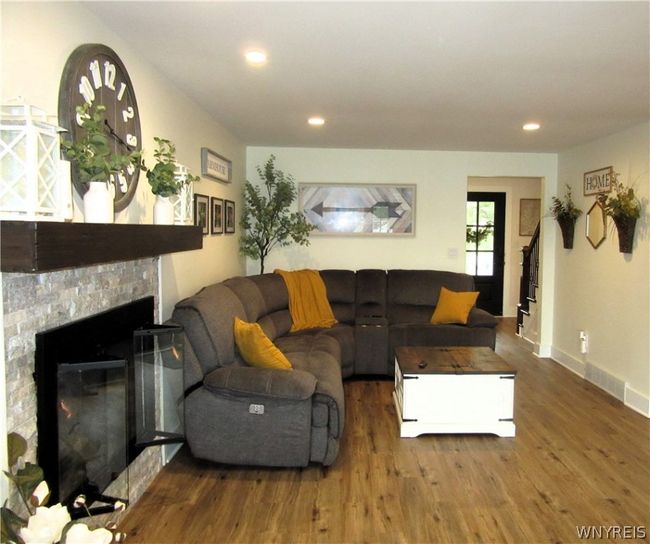 Great room with gas fireplace. | Image 25