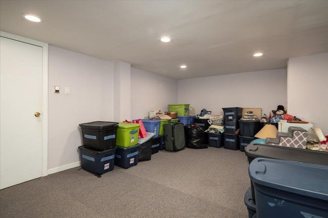 Finished below grade area featuring recessed lighting and carpet floors | Image 26