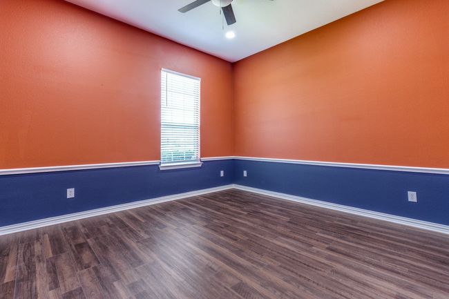 Generational Suite bedroom featuring a ceiling fan and baseboards | Image 23