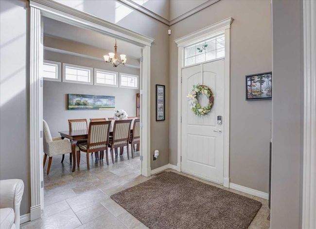 22 Tuscany Estates Crescent Nw, Home with 3 bedrooms, 2 bathrooms and 4 parking in Calgary AB | Image 4