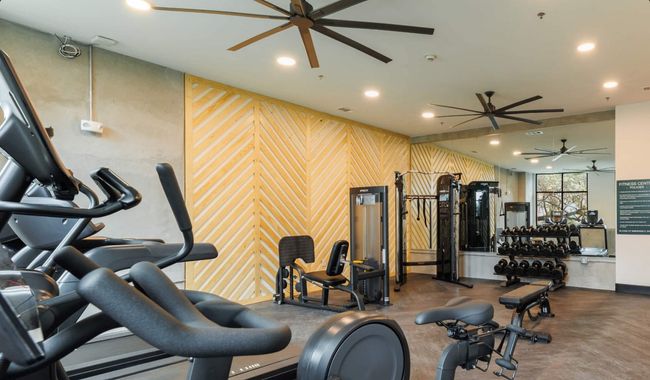 Exercise room featuring ceiling fan and recessed lighting | Image 22