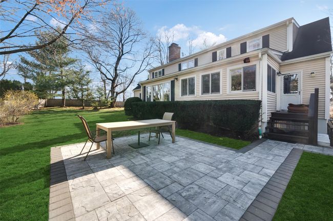 Lovely patio with access to sunroom and mudroom/kitchen | Image 29