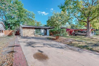 Single story home with a garage | Image 2