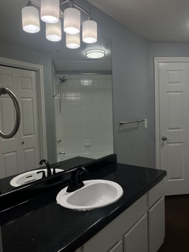 Full bathroom with vanity and shower combination | Image 18