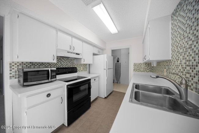 7682 St Andrews Blvd, Condo with 2 bedrooms, 2 bathrooms and null parking in WEEKI WACHEE FL | Image 13