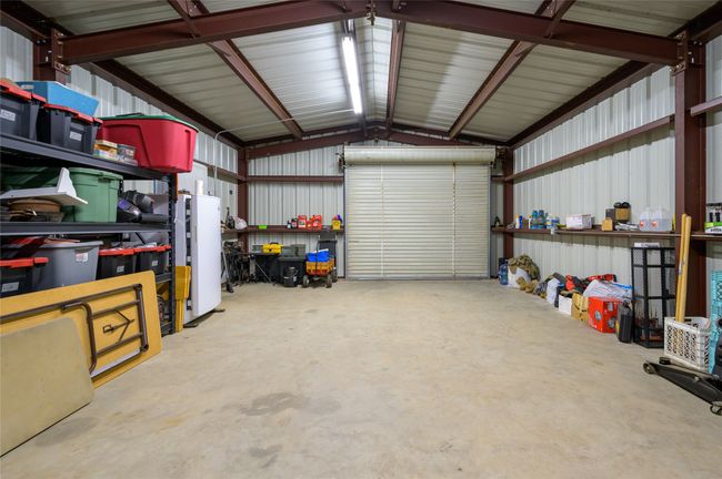 Garage featuring metal wall | Image 32