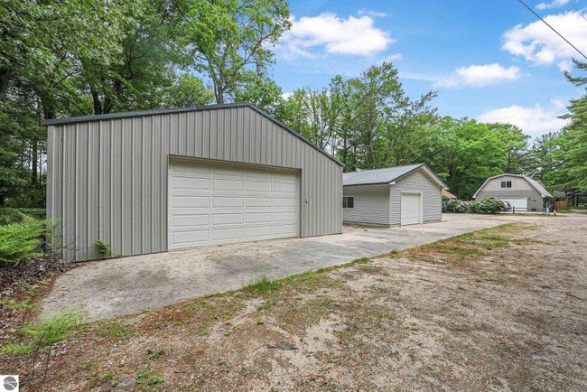 6836 Aarwood Trl Nw, House other with 4 bedrooms, 2 bathrooms and null parking in Rapid City MI | Image 53