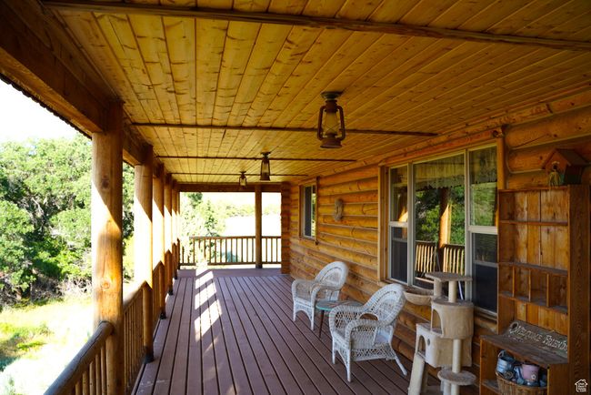 View of wooden porch | Image 7