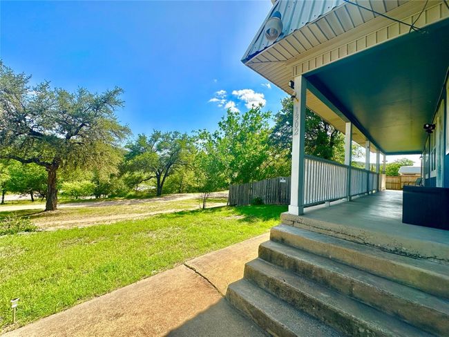 View of yard with a porch | Image 5