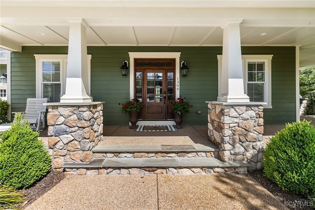 Craftsman elevation featuring aggregate 8' deep wrap around porch. | Image 4