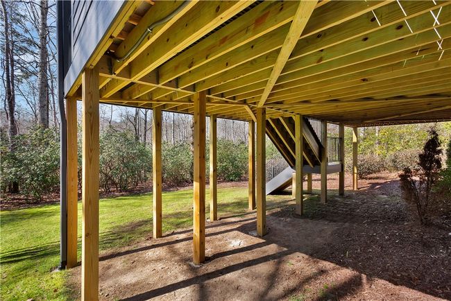 Area under new covered porch and deck. | Image 41