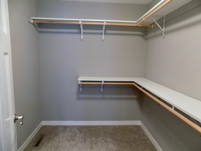 Primary walk-in closet | Image 17