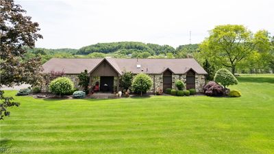 View of front of house with a front yard | Image 1