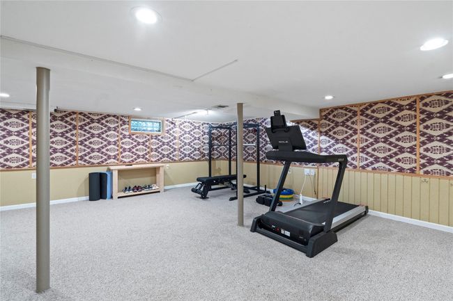 View of green lawn with a deck and view of scattered trees | Image 31