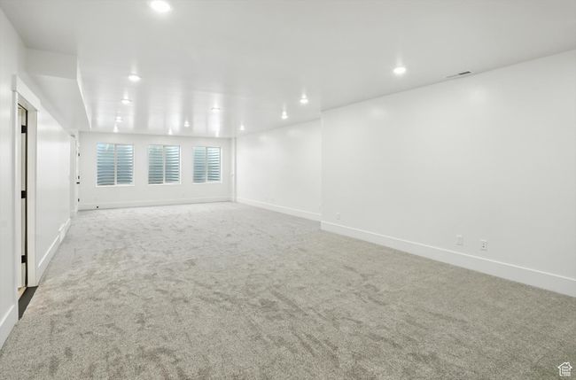 Spare room with carpet flooring and recessed lighting | Image 47