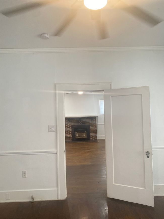 Hall featuring ornamental molding and hardwood / wood-style flooring | Image 11
