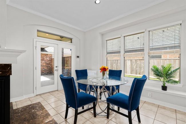 Cozy Breakfast Room with abundant ambient daylight | Image 13