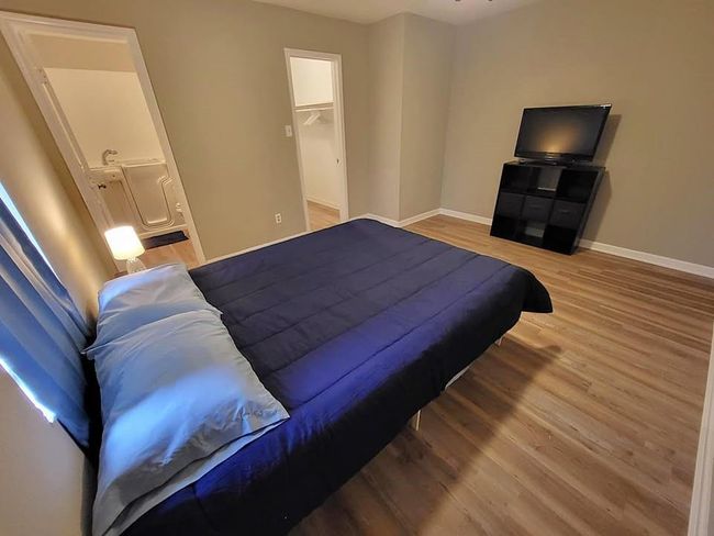Another view of spacious primary bedroom | Image 9