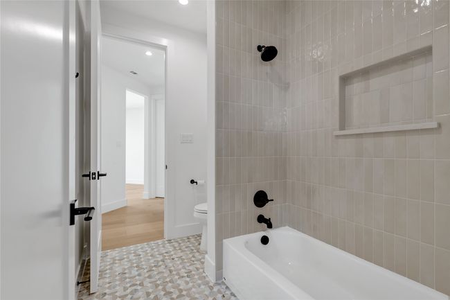 Full bathroom with bathing tub / shower combination and recessed lighting | Image 31