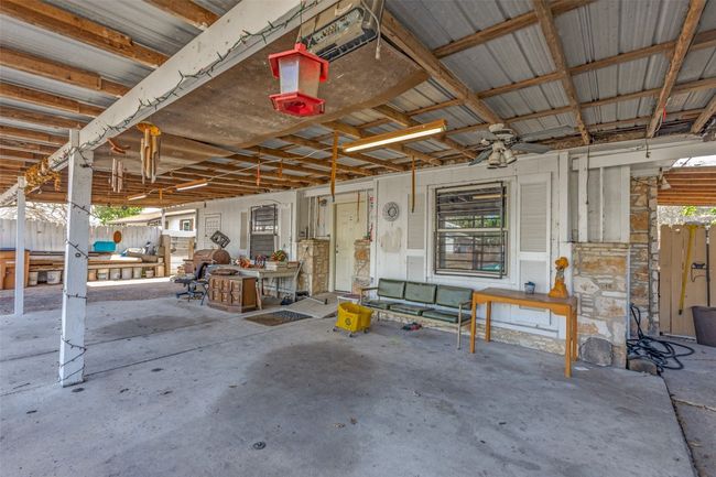 Garage featuring fence | Image 8
