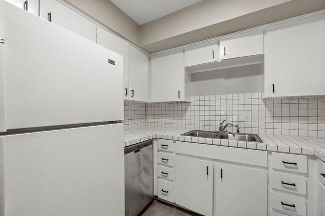 Fridge and dishwasher included. | Image 6