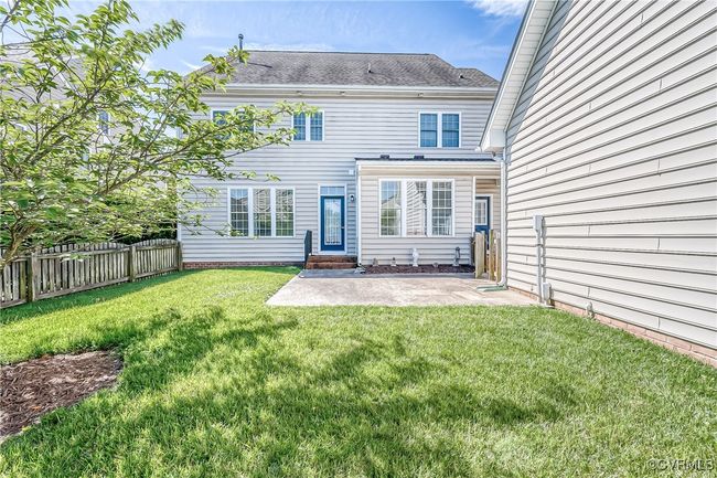 Rear view of house featuring a patio | Image 38