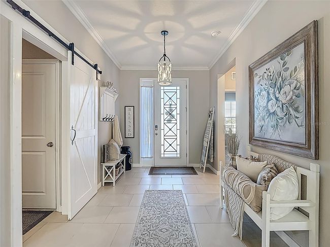 Foyer - Secondary Bedroom wing and Laundy Room & Garage Access | Image 5