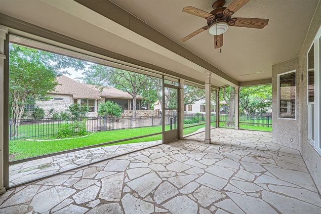 Unfurnished sunroom with a ceiling fan | Image 24