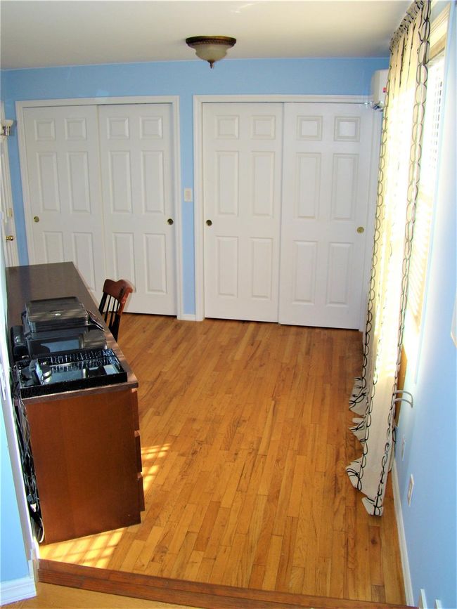Home office featuring light hardwood / wood-style floors | Image 7
