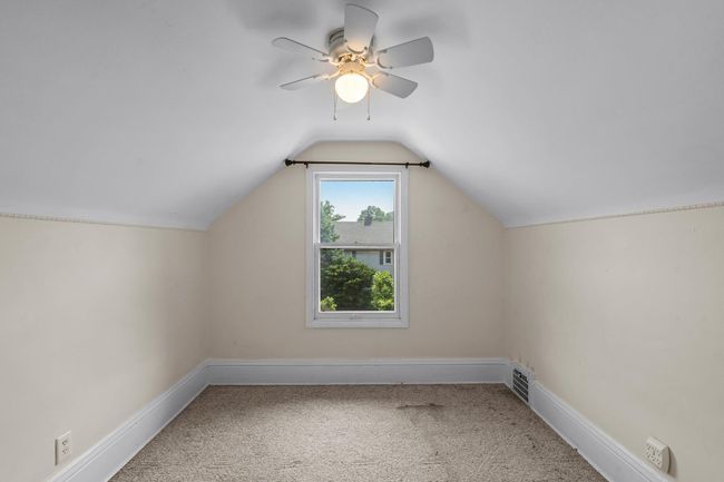 Comfortable and bright, this upper-level unit one bedroom is ideal for rest and privacy. | Image 19