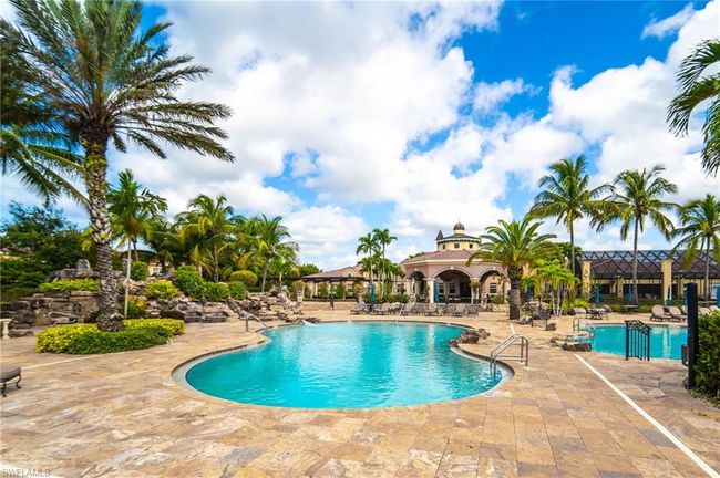View of swimming pool featuring a lanai | Image 23