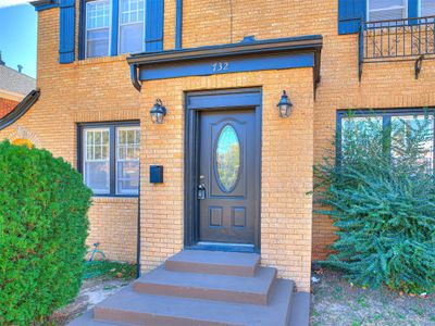 Property entrance with a balcony | Image 3