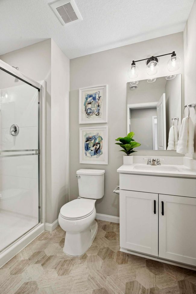 Lower level bathroom. Photos are of similar plan, & may not depict actual home plan. Configurations, features, materials & finishes may contain options that are not included in price.* | Image 25