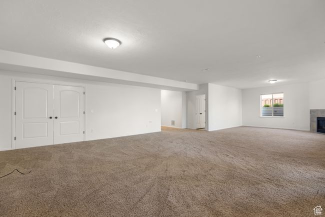 Basement with carpet floors | Image 38