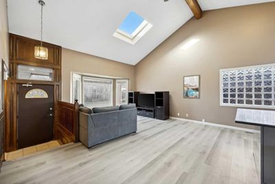 56 Woodfern Way Sw, House other with 4 bedrooms, 2 bathrooms and 4 parking in Calgary AB | Image 2