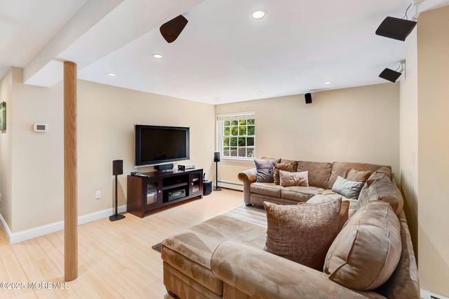 Full sized windows light up the basement | Image 37